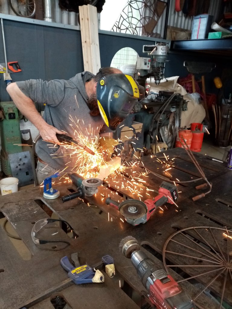 Billy Moore welding back wheel on penny-farthing