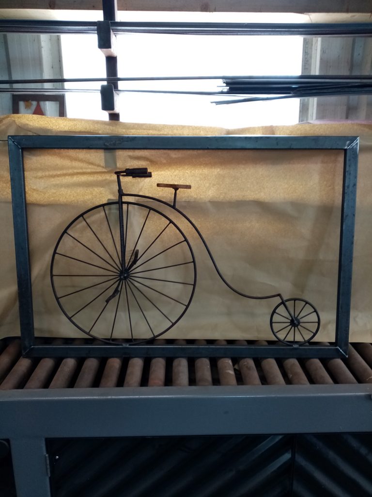 Restored penny-farthing in Billy Moore's workshop.