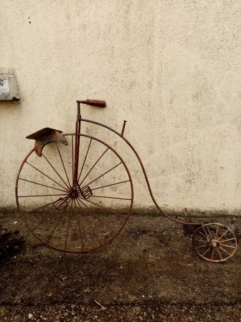 Unrestored penny-farthing.